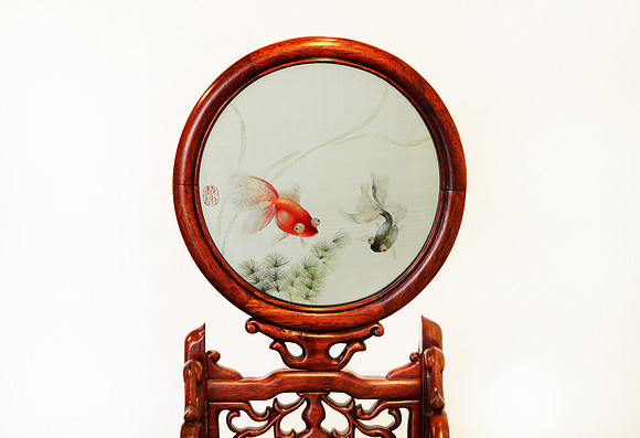 Embroidery photographed with a white backdrop